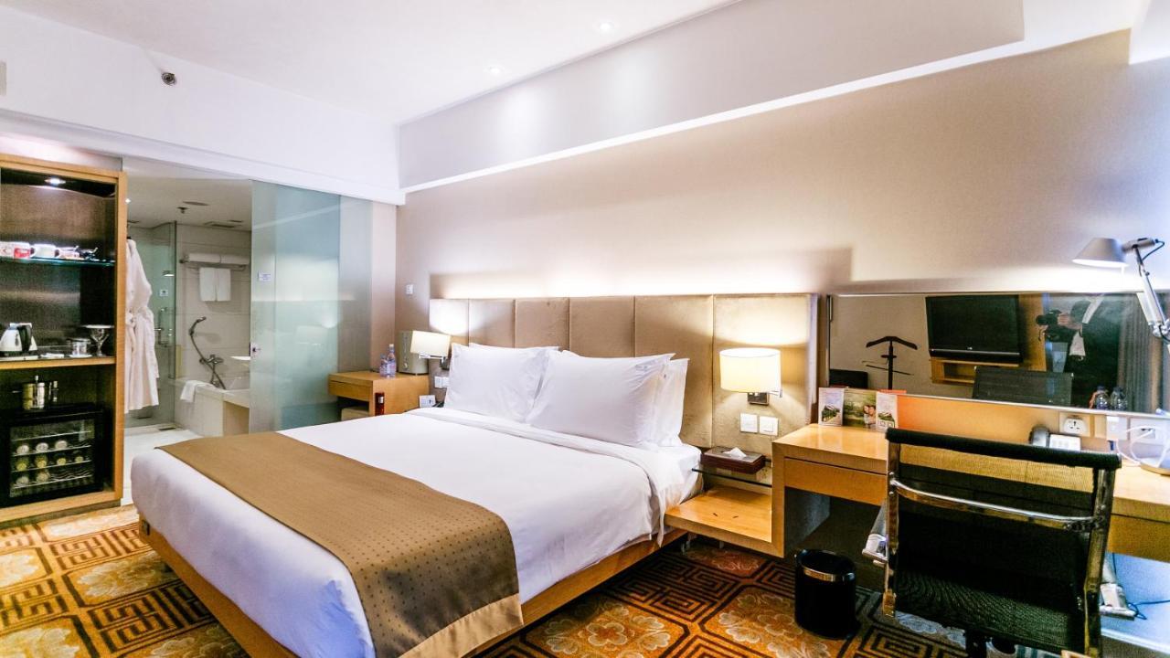 Holiday Inn Binhai Тяньцзінь Номер фото